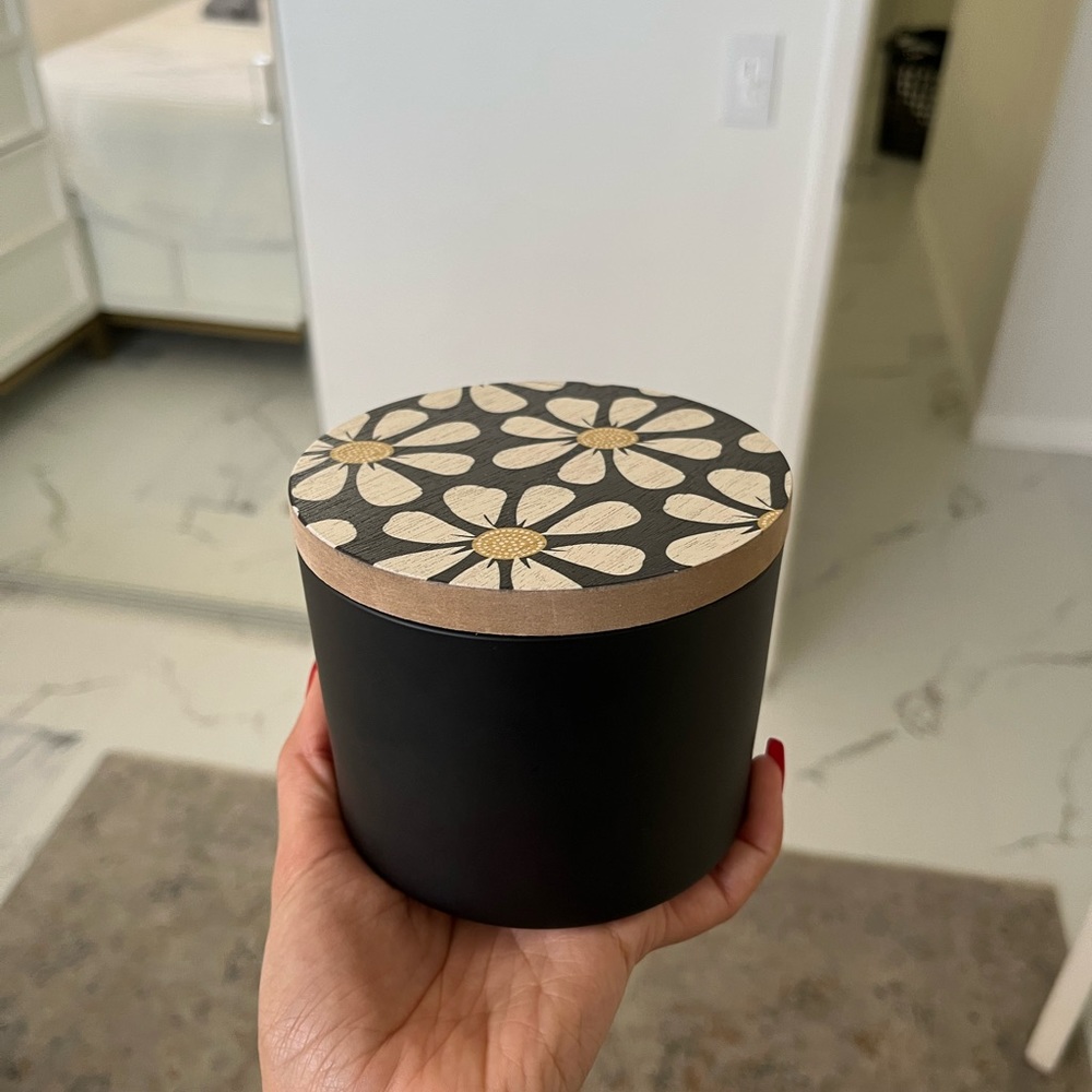 Cute black jar with lid.